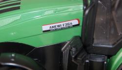 Amewi RC Traktor 2,4 Ghz s přeravníkem zvířat, světla, zvuk 1:24