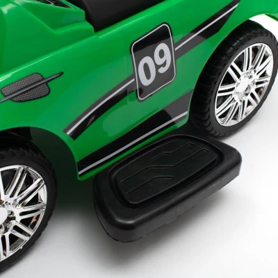 BABY MIX Dětské odrážedlo se zvukem a vodící tyčí RACER zelené